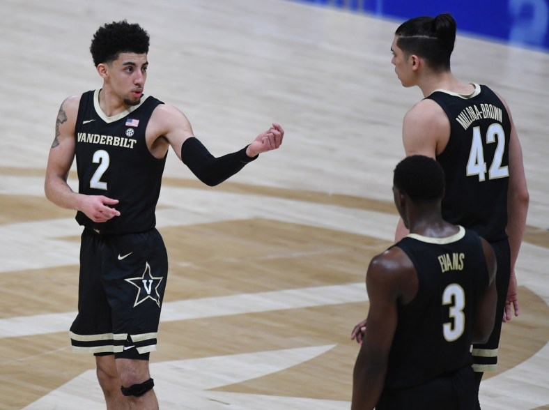 Mar 11, 2021; Nashville, TN, USA; Vanderbilt Commodores guard Scotty Pippen Jr. (2) talks with Vanderbilt Commodores forward Quentin Millora-Brown (42) coming out of a timeout during the second half against the Florida Gators at Bridgestone Arena. Mandatory Credit: Christopher Hanewinckel-USA TODAY Sports