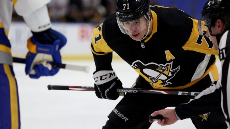 Mar 11, 2021; Buffalo, New York, USA;  Pittsburgh Penguins center Evgeni Malkin (71) waits for a face-off against the Buffalo Sabres during the first period at KeyBank Center. Mandatory Credit: Timothy T. Ludwig-USA TODAY Sports