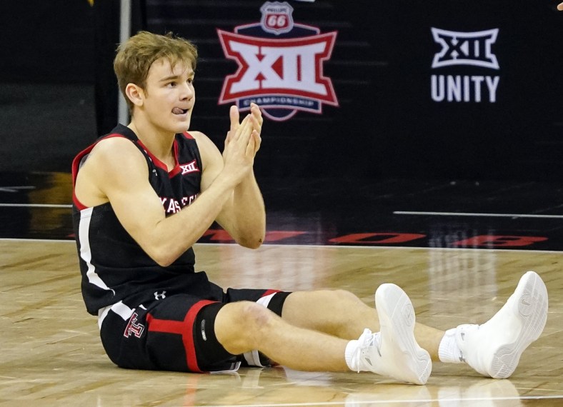 Mar 11, 2021; Kansas City, MO, USA; Texas Tech Red Raiders guard Mac McClung (0) reacts after a play against the Texas Longhorns during the second half at T-Mobile Center. Mandatory Credit: Jay Biggerstaff-USA TODAY Sports