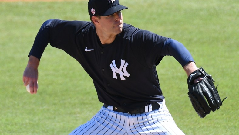 Mar 13, 2021; Tampa, Florida, USA;  New York Yankees pitcher Corey Kluber (28) throws a pitch in the second inning against the Pittsburgh Pirates during spring training at George M. Steinbrenner Field. Mandatory Credit: Jonathan Dyer-USA TODAY Sports