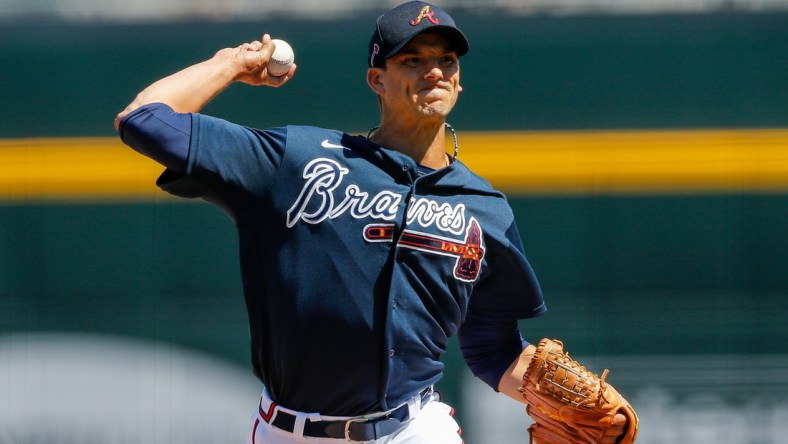 Mar 7, 2021; North Port, Florida, USA;  Atlanta Braves starting pitcher Charlie Morton (50) pitches in the third inning during spring training at CoolToday Park. Mandatory Credit: Nathan Ray Seebeck-USA TODAY Sports