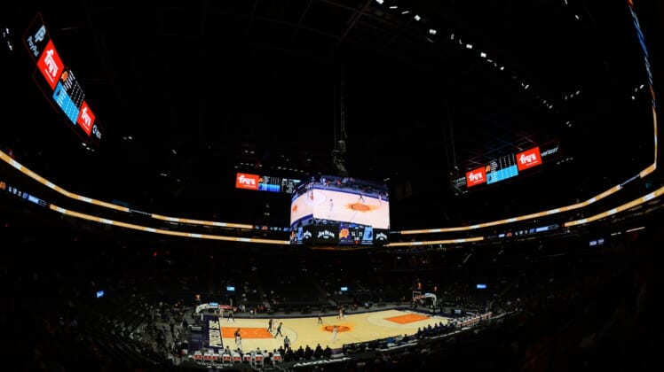 Mar 15, 2021; Phoenix, Arizona, USA; A general view of game action between the Phoenix Suns and the Memphis Grizzlies during the first half at Phoenix Suns Arena. Mandatory Credit: Joe Camporeale-USA TODAY Sports