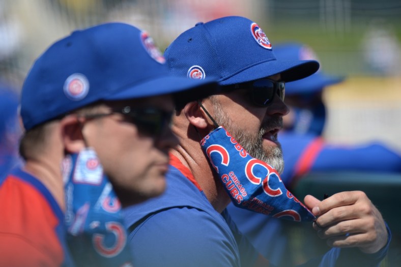 Mar 18, 2021; Goodyear, Arizona, USA; Chicago Cubs manager David Ross looks on against the Cleveland Indians during the first inning of a spring training game at Goodyear Ballpark. Mandatory Credit: Joe Camporeale-USA TODAY Sports