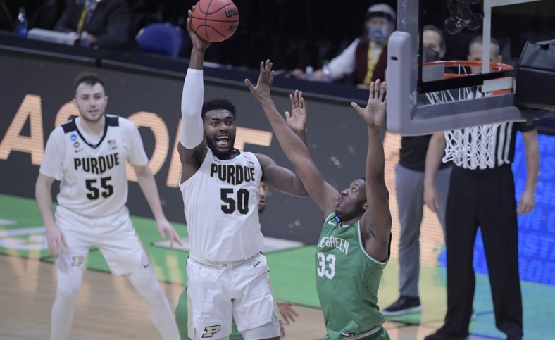Purdue Boilermakers forward Trevion Williams (50) drives to the basket during the first round of the 2021 NCAA Basketball Tournament at Lucas Oil Stadium Friday evening, March 19, 2021. Mandatory Credit: Denny Simmons/IndyStar via USA TODAY Sports