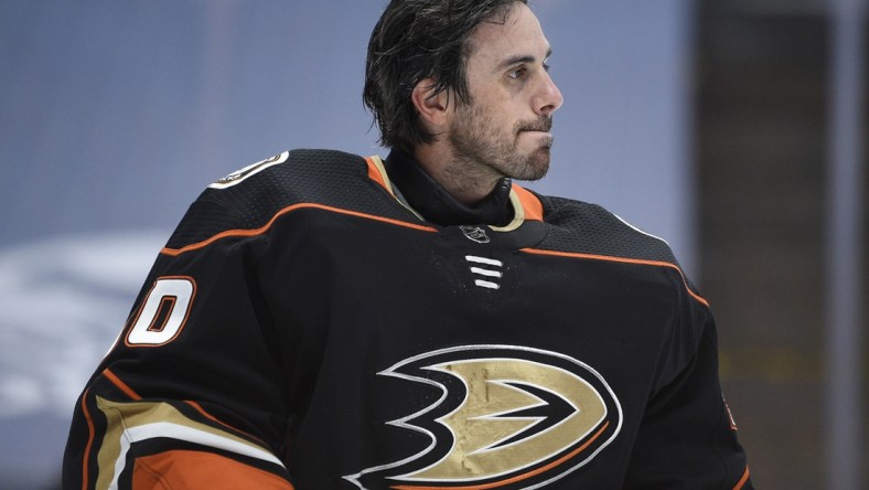 Mar 20, 2021; Anaheim, California, USA; Anaheim Ducks goalie Ryan Miller (30) looks on during a break in play in the first period against the Arizona Coyotes at Honda Center. Mandatory Credit: Kelvin Kuo-USA TODAY Sports