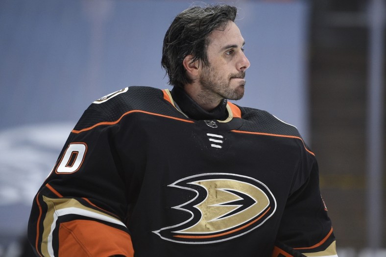 Mar 20, 2021; Anaheim, California, USA; Anaheim Ducks goalie Ryan Miller (30) looks on during a break in play in the first period against the Arizona Coyotes at Honda Center. Mandatory Credit: Kelvin Kuo-USA TODAY Sports