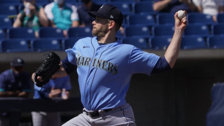 Mar 21, 2021; Phoenix, Arizona, USA; Seattle Mariners starting pitcher James Paxton (44) throws against the Milwaukee Brewers during a spring training game at American Family Fields of Phoenix. Mandatory Credit: Rick Scuteri-USA TODAY Sports