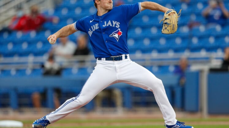 Mar 22, 2021; Dunedin, Florida, USA;  Toronto Blue Jays starting pitcher Ross Stripling (48) pitches in the first inning against the Detroit Tigers during spring training at TD Ballpark. Mandatory Credit: Nathan Ray Seebeck-USA TODAY Sports