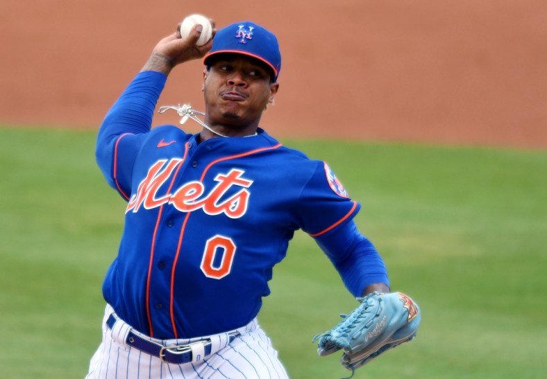 Mar 23, 2021; Port St. Lucie, Florida, USA; New York Mets starting pitcher Marcus Stroman (0) pitches against the Miami Marlins during a spring training baseball game at Clover Park. Mandatory Credit: Jim Rassol-USA TODAY Sports