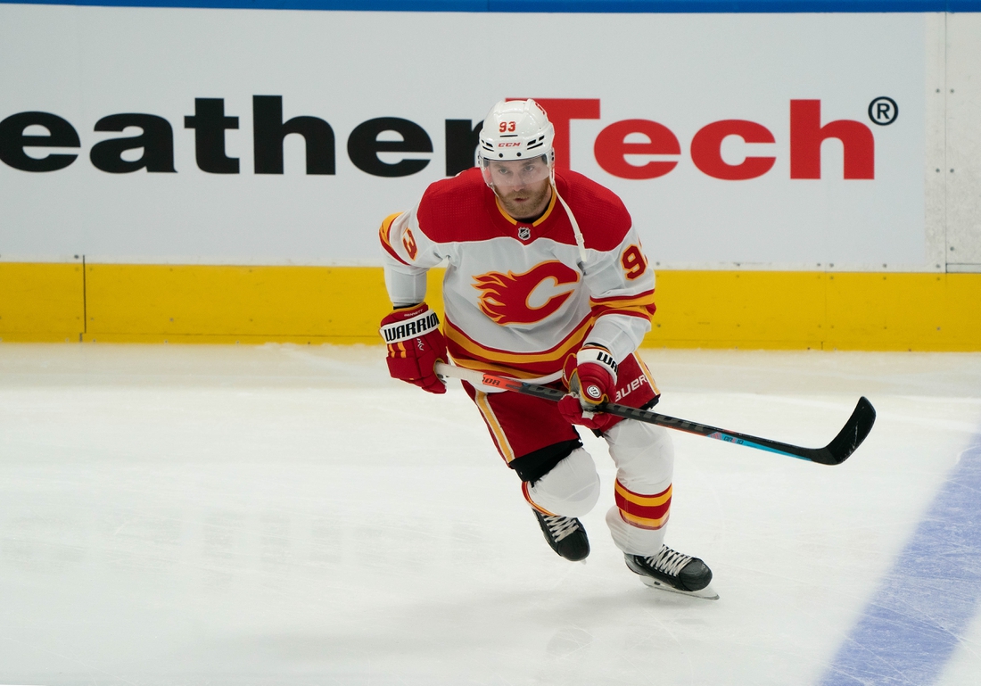 Mar 20, 2021; Toronto, Ontario, CAN; Calgary Flames center Sam Bennett (93) skates during the warm-up against the Toronto Maple Leafs at Scotiabank Arena. Mandatory Credit: Nick Turchiaro-USA TODAY Sports