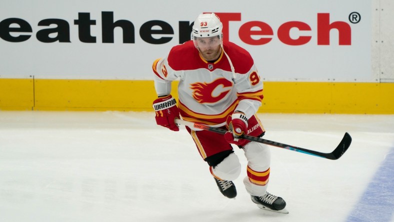 Mar 20, 2021; Toronto, Ontario, CAN; Calgary Flames center Sam Bennett (93) skates during the warm-up against the Toronto Maple Leafs at Scotiabank Arena. Mandatory Credit: Nick Turchiaro-USA TODAY Sports