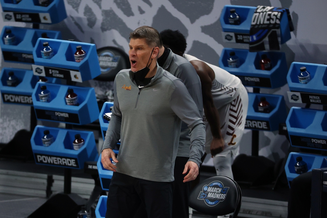 Mar 27, 2021; Indianapolis, IN, USA; Loyola-Chicago Ramblers head coach Porter Moser reacts in the second half against the Oregon State Beavers during the Sweet 16 of the 2021 NCAA Tournament at Bankers Life Fieldhouse.  Mandatory Credit: Trevor Ruszkowski-USA TODAY Sports