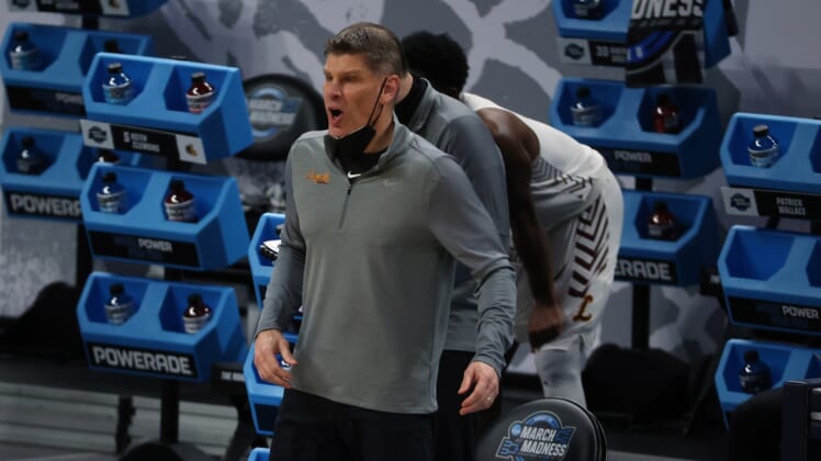 Mar 27, 2021; Indianapolis, IN, USA; Loyola-Chicago Ramblers head coach Porter Moser reacts in the second half against the Oregon State Beavers during the Sweet 16 of the 2021 NCAA Tournament at Bankers Life Fieldhouse.  Mandatory Credit: Trevor Ruszkowski-USA TODAY Sports