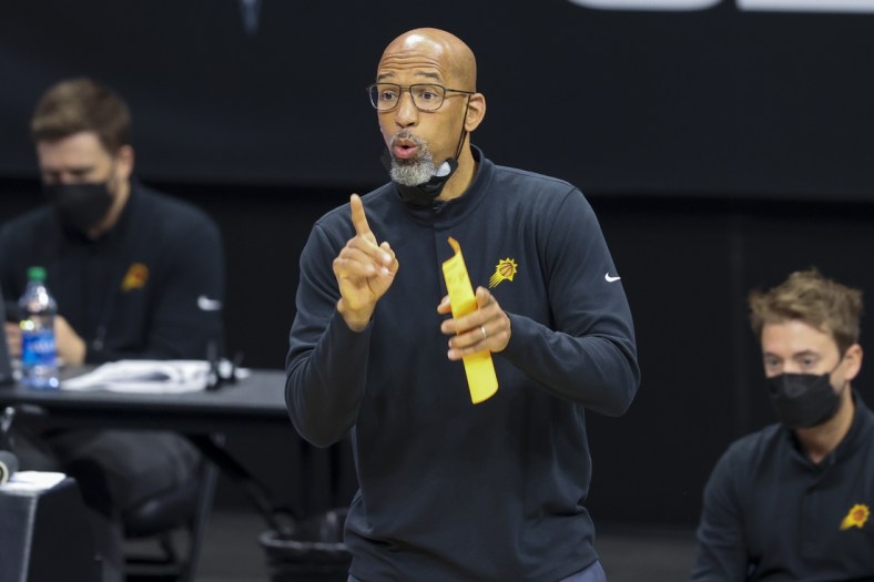 Mar 28, 2021; Charlotte, North Carolina, USA; Phoenix Suns coach Monty Williams directs his team against the Charlotte Hornets during the second quarter at Spectrum Center. Mandatory Credit: Nell Redmond-USA TODAY Sports