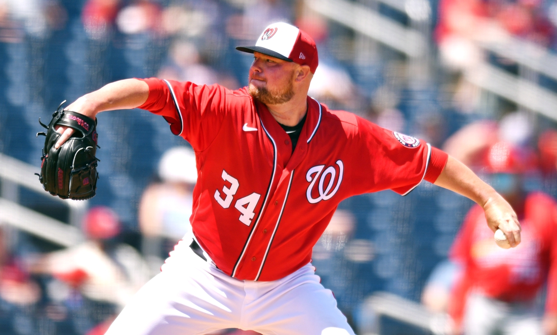 Mar 28, 2021; West Palm Beach, Florida, USA; Washington Nationals starting pitcher Jon Lester (34) pitches against the St. Louis Cardinals during the third inning of a spring training game at Ballpark of the Palm Beaches. Mandatory Credit: Jim Rassol-USA TODAY Sports