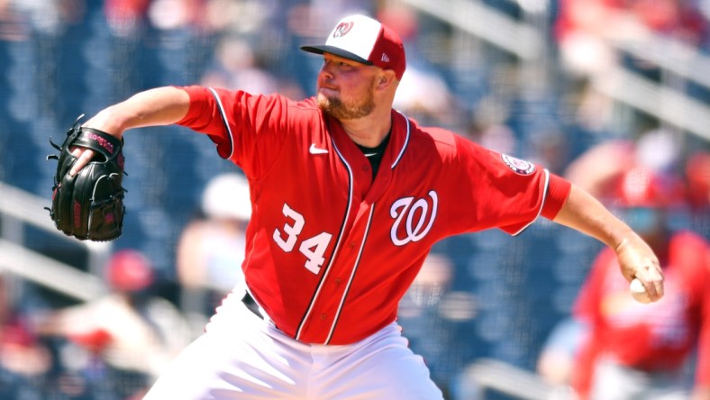 Mar 28, 2021; West Palm Beach, Florida, USA; Washington Nationals starting pitcher Jon Lester (34) pitches against the St. Louis Cardinals during the third inning of a spring training game at Ballpark of the Palm Beaches. Mandatory Credit: Jim Rassol-USA TODAY Sports