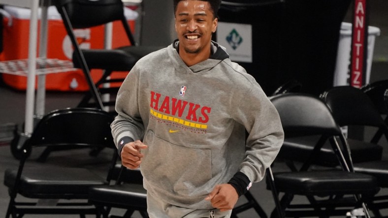 Mar 28, 2021; Denver, Colorado, USA; Atlanta Hawks forward John Collins (20) warms up before the game against the Denver Nuggets at Ball Arena. Mandatory Credit: Ron Chenoy-USA TODAY Sports