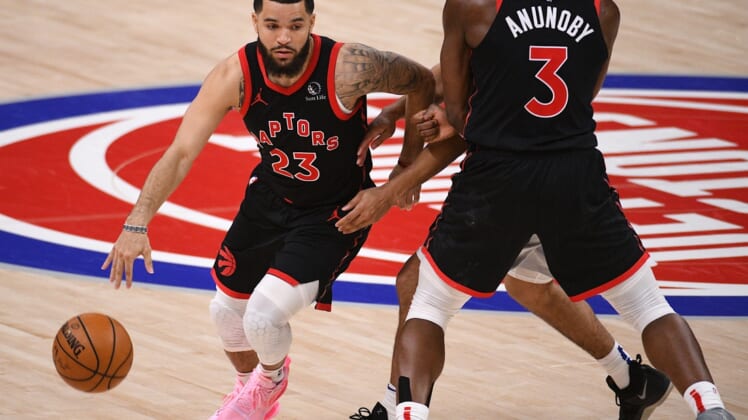 Mar 29, 2021; Detroit, Michigan, USA; Toronto Raptors guard Fred VanVleet (23) drives to the basket as forward OG Anunoby (3) sets a pick during the fourth quarter against the Detroit Pistons at Little Caesars Arena. Mandatory Credit: Tim Fuller-USA TODAY Sports