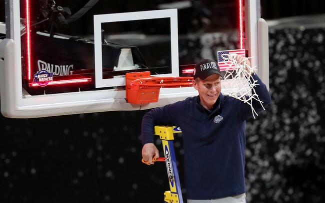 Gonzaga head coach Mark Few cuts down the net after defeating USC during the Elite Eight round of the 2021 NCAA Tournament on Tuesday, March 30, 2021, at Lucas Oil Stadium in Indianapolis, Ind. Mandatory Credit: Kelly Wilkinson/IndyStar via USA TODAY Sports