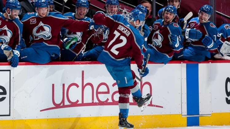 Mar 31, 2021; Denver, Colorado, USA; Colorado Avalanche right wing Joonas Donskoi (72) is doused with water after scoring a hat trick in the first period against the Arizona Coyotes at Ball Arena. Mandatory Credit: Isaiah J. Downing-USA TODAY Sports