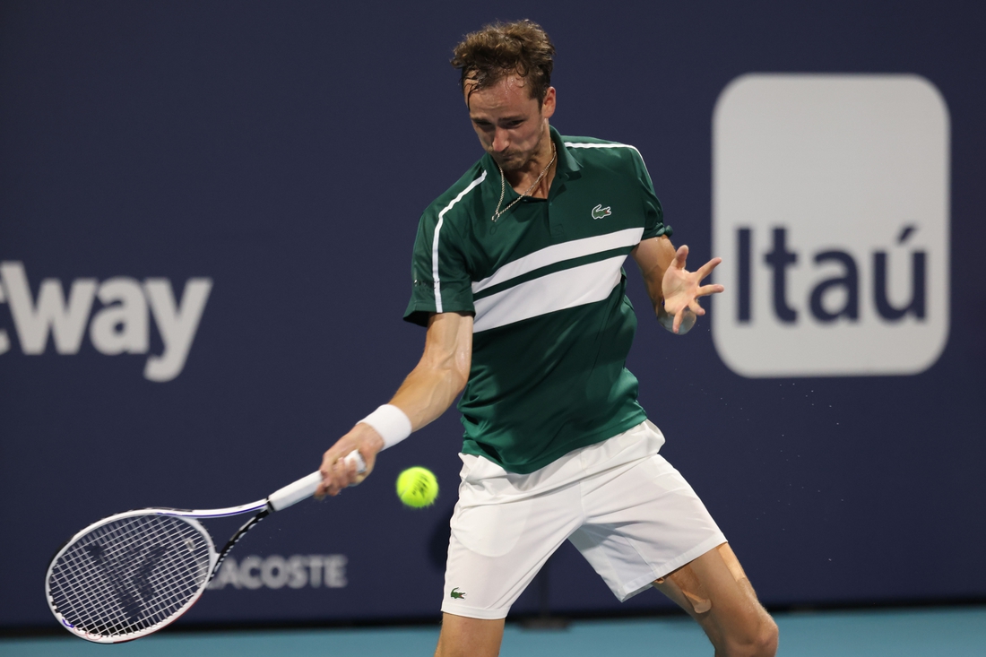 Mar 31, 2021; Miami, Florida, USA; Daniil Medvedev of Russia hits a forehand against Roberto Bautista Agut of Spain (not pictured) in a men's singles quarterfinal in the Miami Open at Hard Rock Stadium. Mandatory Credit: Geoff Burke-USA TODAY Sports