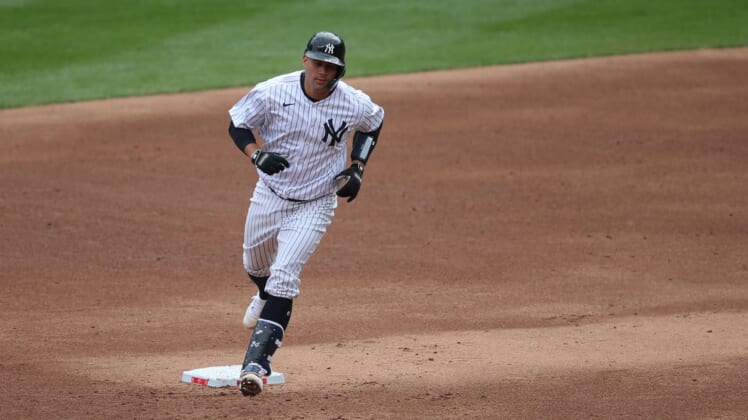Apr 1, 2021; Bronx, New York, USA; New York Yankees catcher Gary Sanchez (24) rounds the bases after hitting a two run home run against the Toronto Blue Jays during the second inning of an opening day game at Yankee Stadium. Mandatory Credit: Brad Penner-USA TODAY Sports