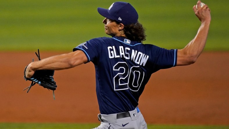 Apr 1, 2021; Miami, Florida, USA; Tampa Bay Rays starting pitcher Tyler Glasnow (20) delivers a pitch in the 1st inning against the Miami Marlins at loanDepot park. Mandatory Credit: Jasen Vinlove-USA TODAY Sports