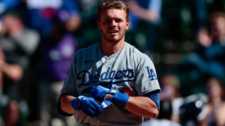 Apr 1, 2021; Denver, Colorado, USA; Los Angeles Dodgers second baseman Gavin Lux (9) reacts after striking out in the third inning against the Colorado Rockies at Coors Field. Mandatory Credit: Isaiah J. Downing-USA TODAY Sports