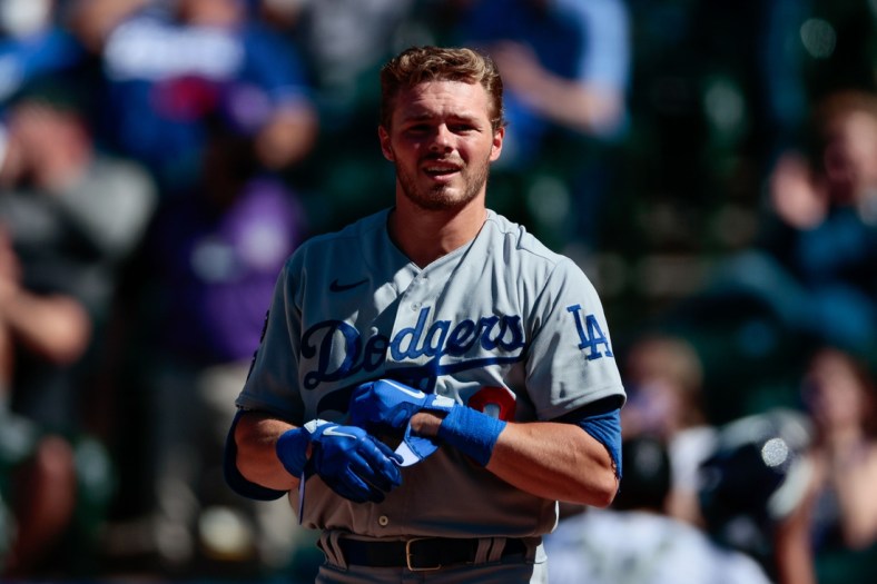 Apr 1, 2021; Denver, Colorado, USA; Los Angeles Dodgers second baseman Gavin Lux (9) reacts after striking out in the third inning against the Colorado Rockies at Coors Field. Mandatory Credit: Isaiah J. Downing-USA TODAY Sports