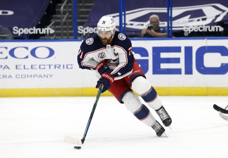 Apr 1, 2021; Tampa, Florida, USA; Columbus Blue Jackets left wing Nick Foligno (71) skates with the puck against the Tampa Bay Lightning during the first period at Amalie Arena. Mandatory Credit: Kim Klement-USA TODAY Sports