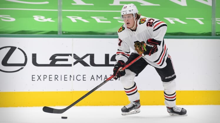 Mar 11, 2021; Dallas, Texas, USA; Chicago Blackhawks defenseman Adam Boqvist (27) in action during the game between the Dallas Stars and the Chicago Blackhawks at the American Airlines Center. Mandatory Credit: Jerome Miron-USA TODAY Sports