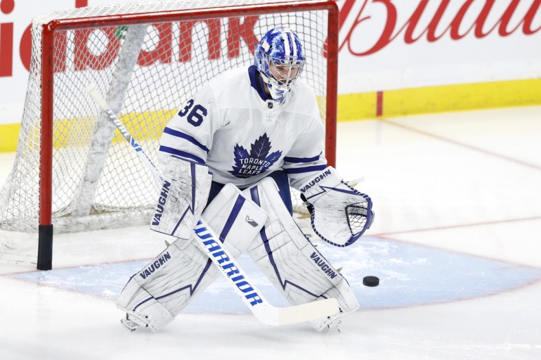 Apr 2, 2021; Winnipeg, Manitoba, CAN;  Toronto Maple Leafs goaltender Jack Campbell (36) warms up before a game against the Winnipeg Jets at Bell MTS Place. Mandatory Credit: James Carey Lauder-USA TODAY Sports