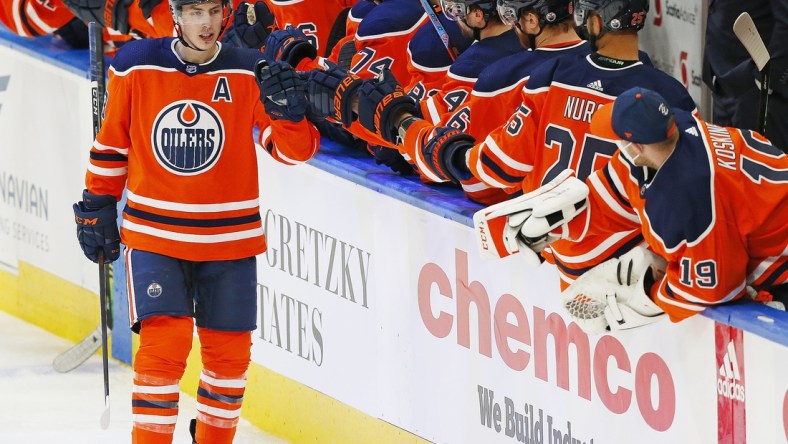 Apr 2, 2021; Edmonton, Alberta, CAN; Edmonton Oilers forward Ryan Nugent-Hopkins (93) celebrates a second period goal against the Calgary Flames at Rogers Place. Mandatory Credit: Perry Nelson-USA TODAY Sports