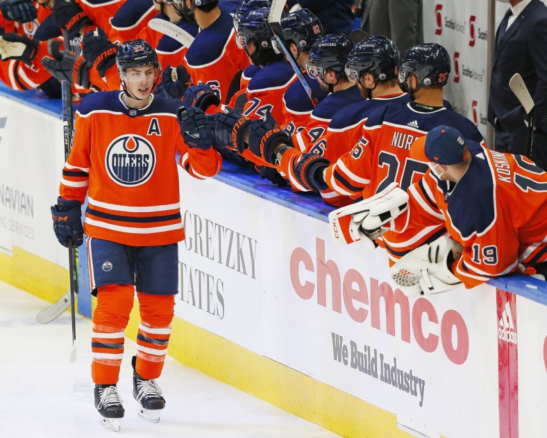 Apr 2, 2021; Edmonton, Alberta, CAN; Edmonton Oilers forward Ryan Nugent-Hopkins (93) celebrates a second period goal against the Calgary Flames at Rogers Place. Mandatory Credit: Perry Nelson-USA TODAY Sports