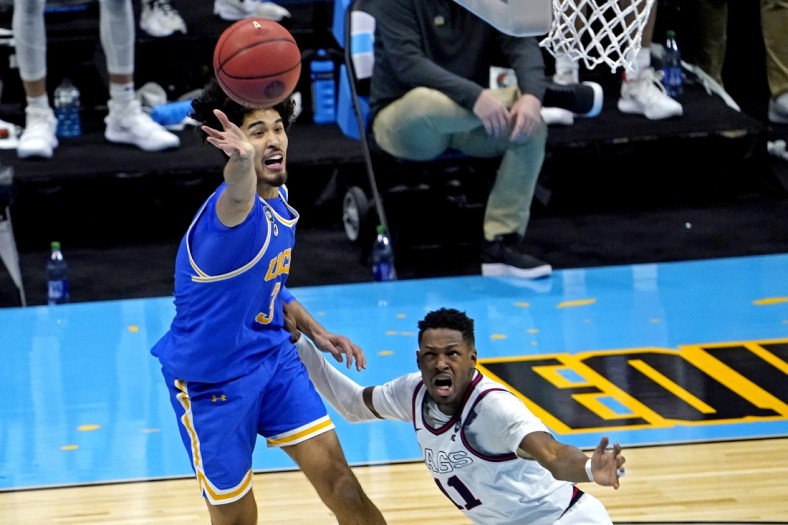 Apr 3, 2021; Indianapolis, Indiana, USA; UCLA Bruins guard Johnny Juzang (3) and Gonzaga Bulldogs guard Joel Ayayi (11) go for the ball during the second half in the national semifinals of the Final Four of the 2021 NCAA Tournament at Lucas Oil Stadium. Mandatory Credit: Robert Deutsch-USA TODAY Sports