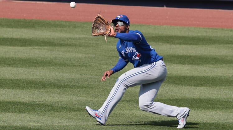Apr 4, 2021; Bronx, New York, USA; Toronto Blue Jays right fielder Teoscar Hernandez (37) makes a catch for an out during the ninth inning against the New York Yankees at Yankee Stadium. Mandatory Credit: Vincent Carchietta-USA TODAY Sports