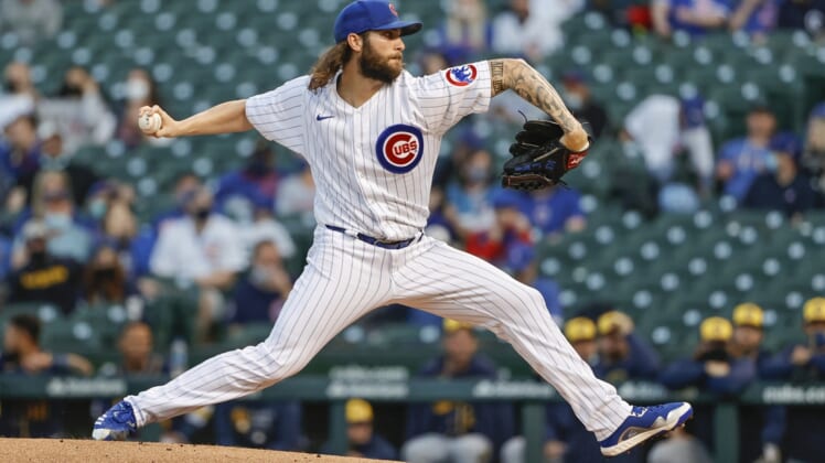 Apr 5, 2021; Chicago, Illinois, USA; Chicago Cubs starting pitcher Trevor Williams (32) delivers against the Milwaukee Brewers during the first inning at Wrigley Field. Mandatory Credit: Kamil Krzaczynski-USA TODAY Sports
