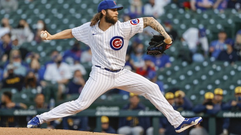 Apr 5, 2021; Chicago, Illinois, USA; Chicago Cubs starting pitcher Trevor Williams (32) delivers against the Milwaukee Brewers during the first inning at Wrigley Field. Mandatory Credit: Kamil Krzaczynski-USA TODAY Sports