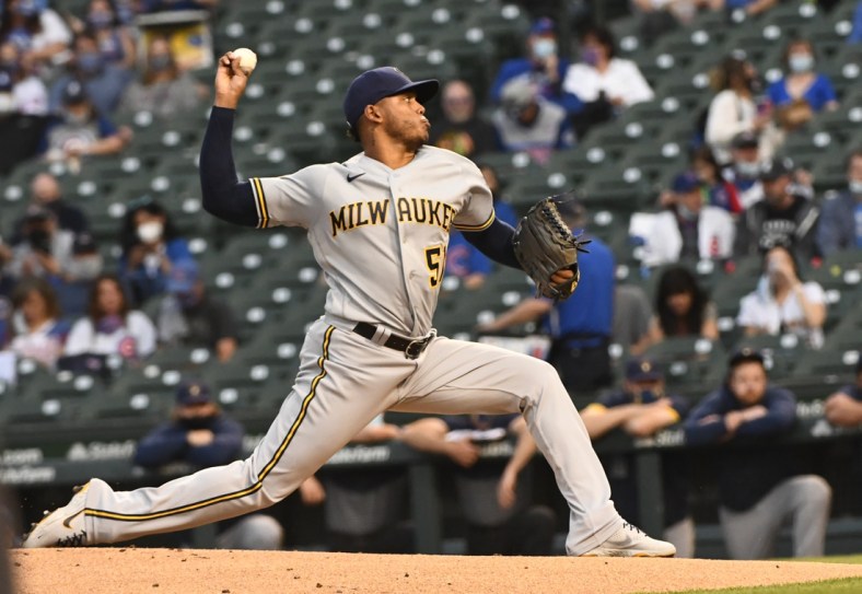 Apr 6, 2021; Chicago, Illinois, USA;  Milwaukee Brewers starting pitcher Freddy Peralta (51) delivers against the Chicago Cubs in the first inning at Wrigley Field. Mandatory Credit: Matt Marton-USA TODAY Sports