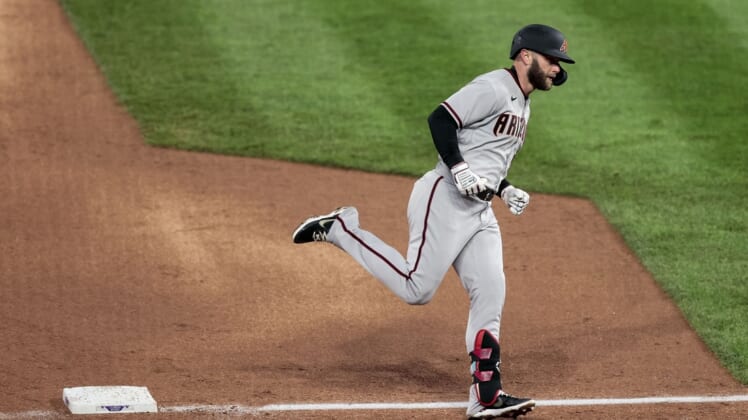 Apr 6, 2021; Denver, Colorado, USA; Arizona Diamondbacks first baseman Christian Walker (53) rounds the bases on a two run homer in the sixth inning against the Colorado Rockies at Coors Field. Mandatory Credit: Isaiah J. Downing-USA TODAY Sports