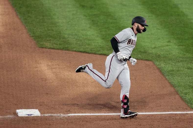 Apr 6, 2021; Denver, Colorado, USA; Arizona Diamondbacks first baseman Christian Walker (53) rounds the bases on a two run homer in the sixth inning against the Colorado Rockies at Coors Field. Mandatory Credit: Isaiah J. Downing-USA TODAY Sports