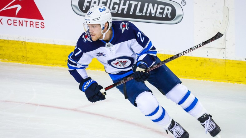 Mar 26, 2021; Calgary, Alberta, CAN; Winnipeg Jets left wing Nikolaj Ehlers (27) skates against the Calgary Flames during the first period at Scotiabank Saddledome. Mandatory Credit: Sergei Belski-USA TODAY Sports