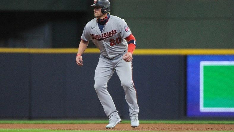 Apr 1, 2021; Milwaukee, Wisconsin, USA;  Minnesota Twins third baseman Josh Donaldson (20) on second base at American Family Field. Mandatory Credit: Michael McLoone-USA TODAY Sports