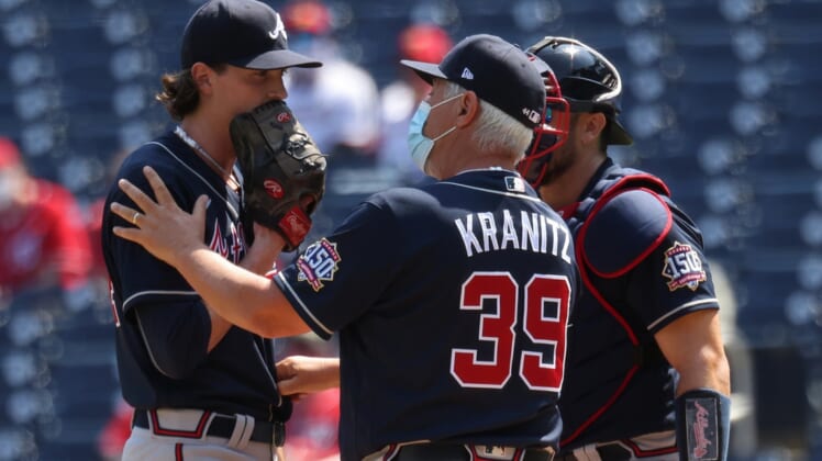 Apr 7, 2021; Washington, District of Columbia, USA; Atlanta Braves pitching coach Rick Kranitz (39) talks to Braves starting pitcher Max Fried (54) during a mound visit against the Washington Nationals in the first inning at Nationals Park. Mandatory Credit: Geoff Burke-USA TODAY Sports