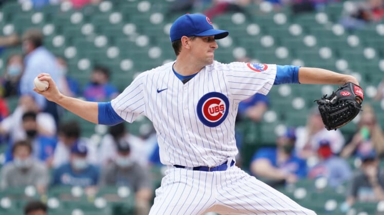 Apr 7, 2021; Chicago, Illinois, USA; Chicago Cubs starting pitcher Kyle Hendricks (28) throws against the Milwaukee Brewers during the first inning at Wrigley Field. Mandatory Credit: David Banks-USA TODAY Sports