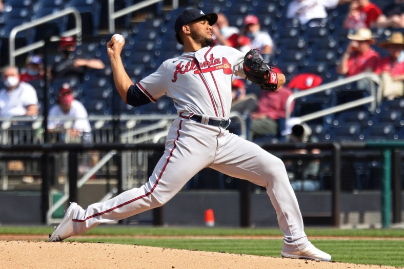 Apr 7, 2021; Washington, District of Columbia, USA; Atlanta Braves starting pitcher Huascar Ynoa (19) pitches against the Washington Nationals in the first inning at Nationals Park. Mandatory Credit: Geoff Burke-USA TODAY Sports