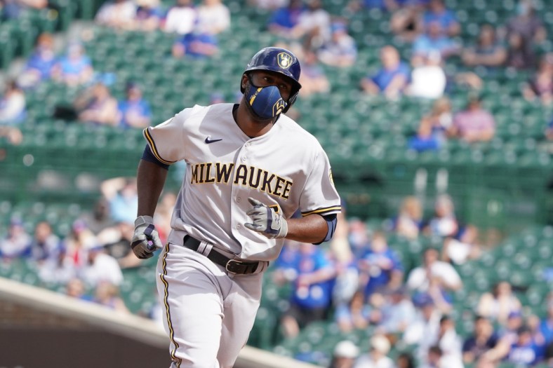 Apr 7, 2021; Chicago, Illinois, USA; Milwaukee Brewers center fielder Lorenzo Cain (6) runs the bases after hitting a home run against the Chicago Cubs during the eighth inning at Wrigley Field. Mandatory Credit: David Banks-USA TODAY Sports