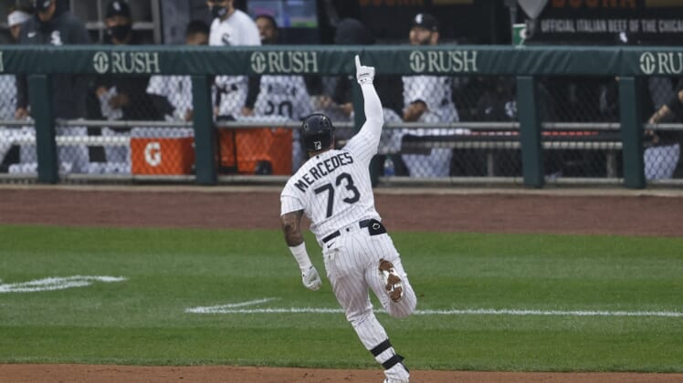 Apr 8, 2021; Chicago, Illinois, USA; Chicago White Sox catcher Yermin Mercedes (73) gestures as he rounds the bases after hitting a home run against the Kansas City Royals during the first inning at Guaranteed Rate Field. Mandatory Credit: Kamil Krzaczynski-USA TODAY Sports