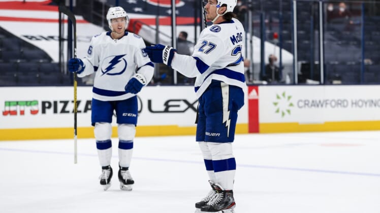 Apr 8, 2021; Columbus, Ohio, USA; Tampa Bay Lightning defenseman Ryan McDonagh (27) celebrates with teammates after scoring a goal against the Columbus Blue Jackets in the second period at Nationwide Arena. Mandatory Credit: Aaron Doster-USA TODAY Sports