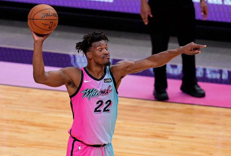 Apr 8, 2021; Miami, Florida, USA; Miami Heat forward Jimmy Butler (22) directs a play against the Los Angeles Lakers during the second half at American Airlines Arena. Mandatory Credit: Jasen Vinlove-USA TODAY Sports